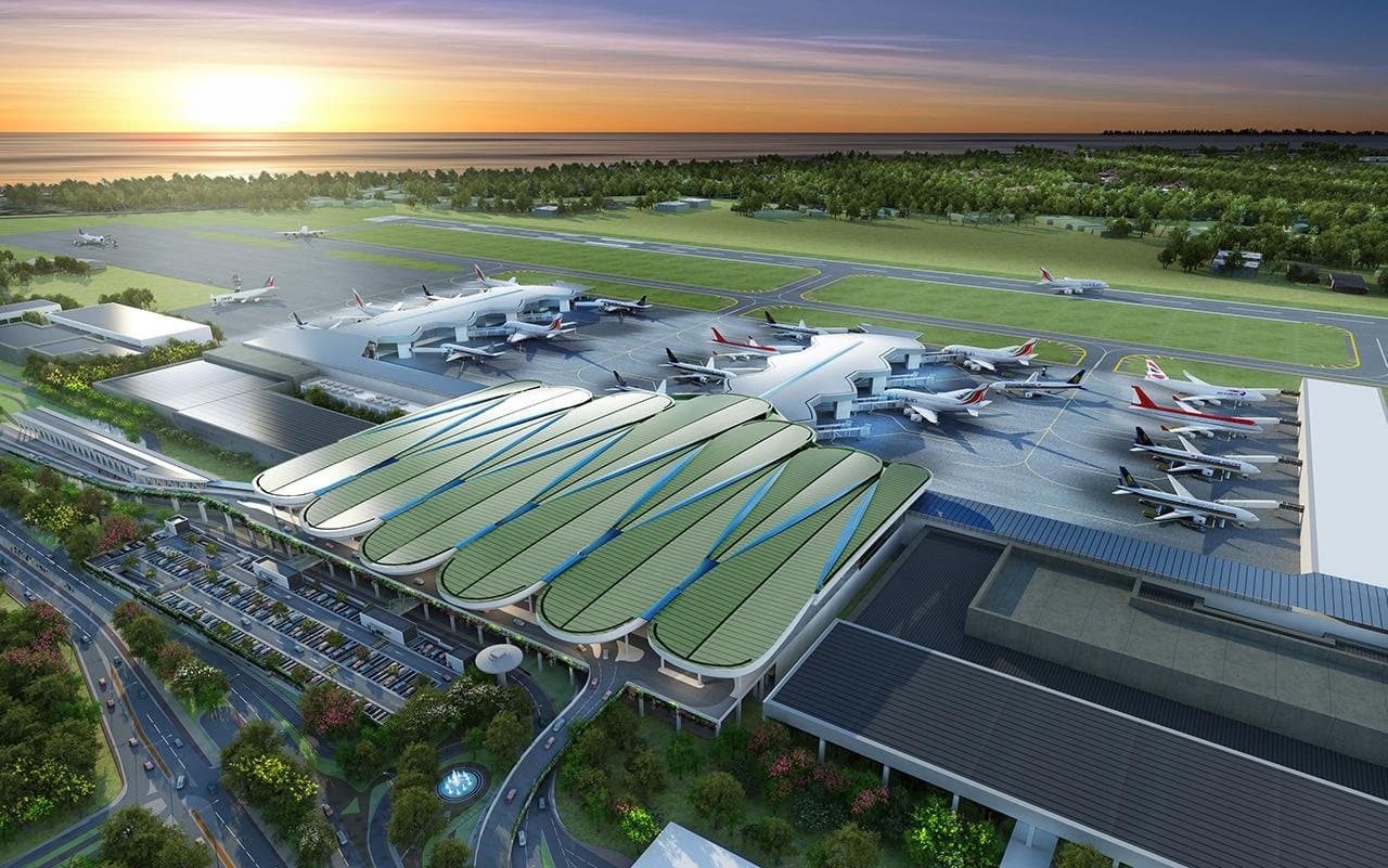 Aerial rendering of an airport terminal building with aircraft parked at the gates